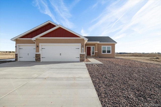 craftsman-style home with a garage