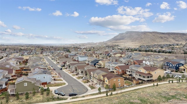 19760 W 59th Dr, Golden, CO 80403 - aerial perspective of suburban area with a mountainous background