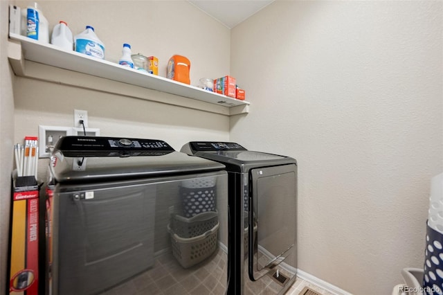 19760 W 59th Dr, Golden, CO 80403 - laundry room with washer and clothes dryer