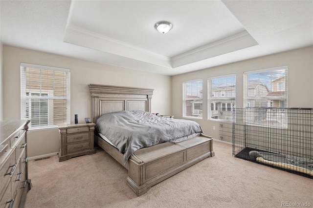 19760 W 59th Dr, Golden, CO 80403 - bedroom with crown molding, a raised ceiling, and light colored carpet