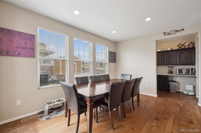19760 W 59th Dr, Golden, CO 80403 - dining area featuring wood finished floors and recessed lighting