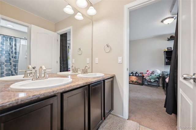 19760 W 59th Dr, Golden, CO 80403 - bathroom featuring double vanity