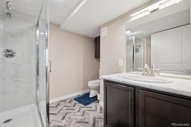 19760 W 59th Dr, Golden, CO 80403 - full bathroom featuring vanity, a shower stall, and brick patterned flooring