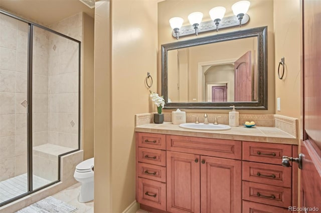 bathroom with an enclosed shower, vanity, toilet, and tile patterned flooring