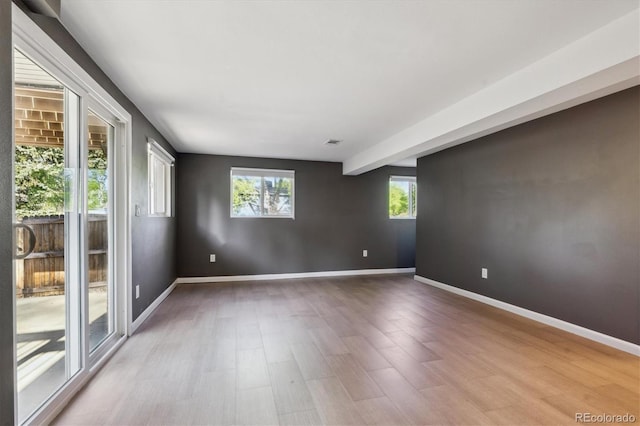 10909 W 65th Way, Arvada, CO 80004 - spare room with wood finished floors and baseboards