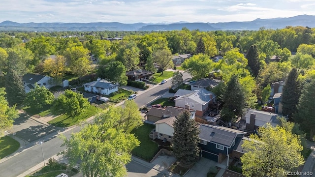 10909 W 65th Way, Arvada, CO 80004 - aerial view of residential area with a mountain backdrop