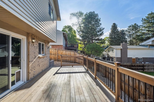 10909 W 65th Way, Arvada, CO 80004 - wooden terrace with a fenced backyard