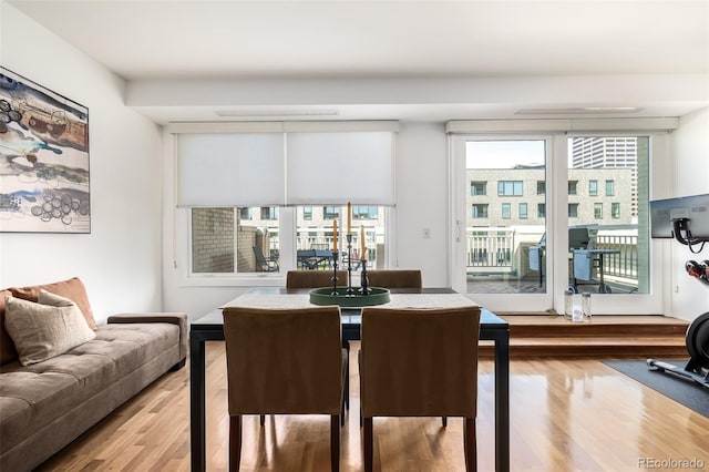 dining area featuring hardwood / wood-style floors