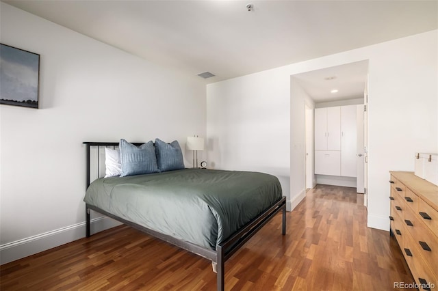 bedroom featuring wood-type flooring