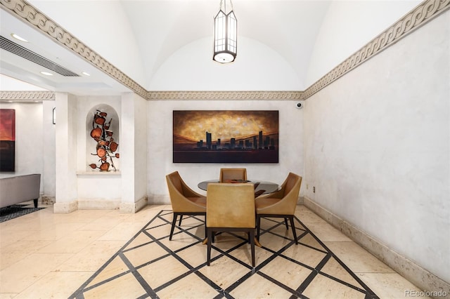 dining area with lofted ceiling