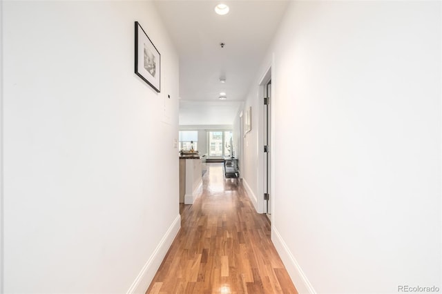 hall featuring light hardwood / wood-style floors