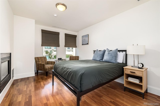 bedroom featuring hardwood / wood-style flooring