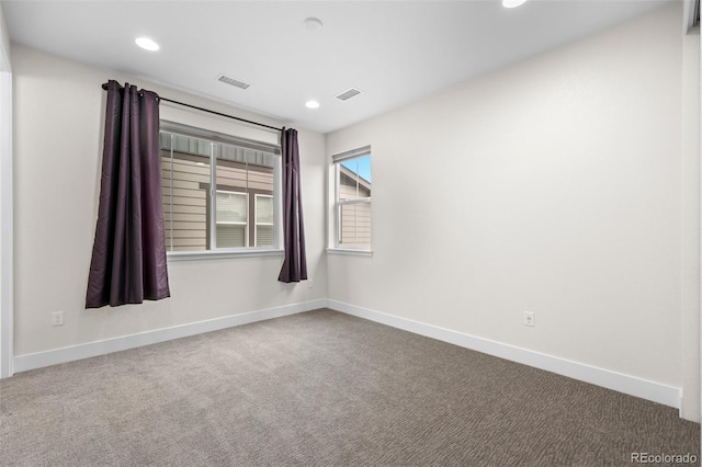 empty room with carpet floors