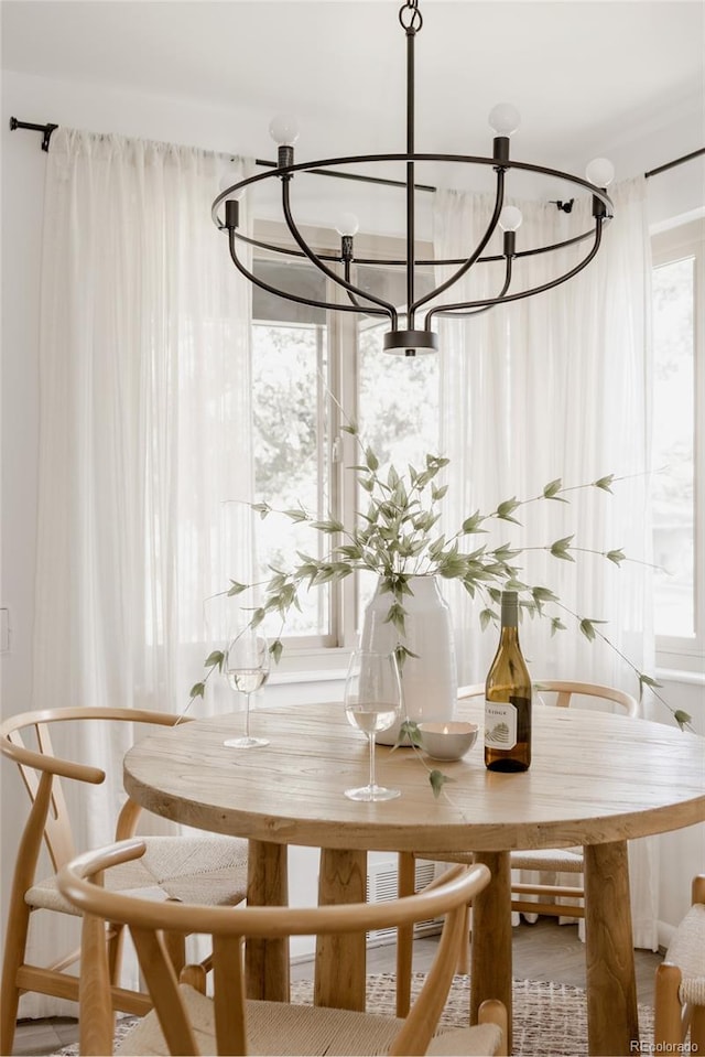 916 Florence St, Aurora, CO 80010 - dining area featuring a chandelier