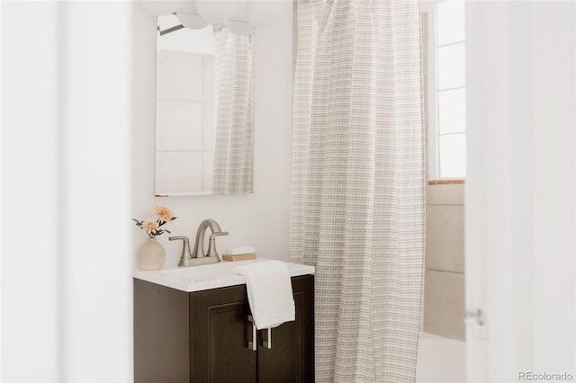 916 Florence St, Aurora, CO 80010 - full bathroom with vanity and shower / bath combination with curtain
