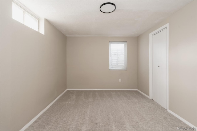 916 Florence St, Aurora, CO 80010 - unfurnished room featuring carpet flooring and healthy amount of natural light