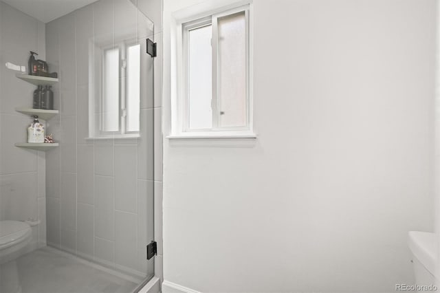 3881 S Bahama St, Aurora, CO 80013 - bathroom featuring toilet and a shower stall
