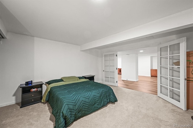 3881 S Bahama St, Aurora, CO 80013 - carpeted bedroom featuring baseboards and french doors