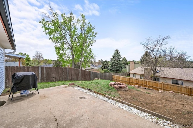 3881 S Bahama St, Aurora, CO 80013 - view of patio / terrace with grilling area and a fire pit