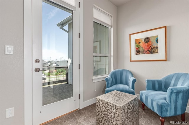 5834 Beeler Ct, Denver, CO 80238 - living area featuring carpet and baseboards