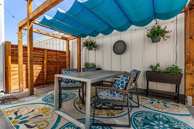 5834 Beeler Ct, Denver, CO 80238 - view of patio / terrace with outdoor dining area and a pergola