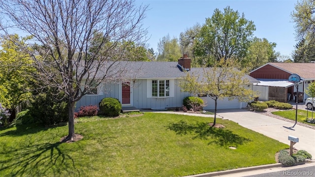 1322 Wicklow St, Boulder, CO 80303 - ranch-style home with board and batten siding, a chimney, concrete driveway, a garage, and a front lawn