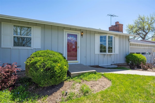 1322 Wicklow St, Boulder, CO 80303 - entrance to property featuring board and batten siding and a chimney