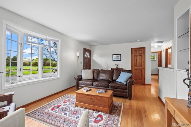 1322 Wicklow St, Boulder, CO 80303 - living area with light wood finished floors and baseboards