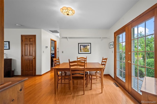 1322 Wicklow St, Boulder, CO 80303 - dining space featuring light wood-type flooring and french doors