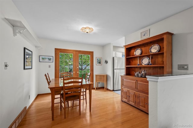 1322 Wicklow St, Boulder, CO 80303 - dining room with light wood finished floors and baseboards