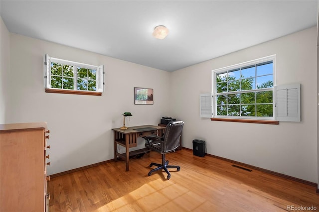 1322 Wicklow St, Boulder, CO 80303 - office area with light wood-style flooring and baseboards