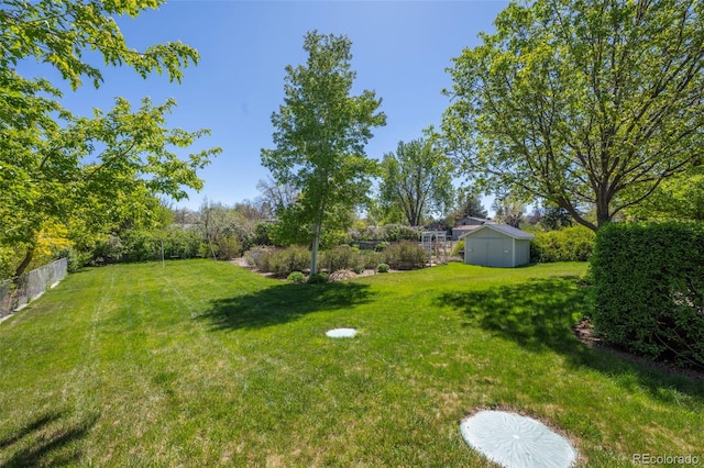 1322 Wicklow St, Boulder, CO 80303 - view of yard featuring an outbuilding and a storage shed