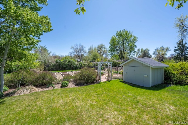 1322 Wicklow St, Boulder, CO 80303 - view of green lawn featuring a shed and an outdoor structure
