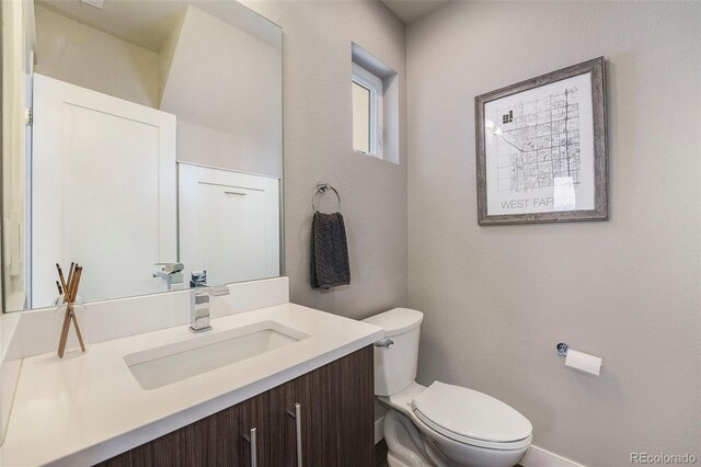 2726 Federal Blvd Unit 1, Denver, CO 80211 - bathroom with toilet and vanity