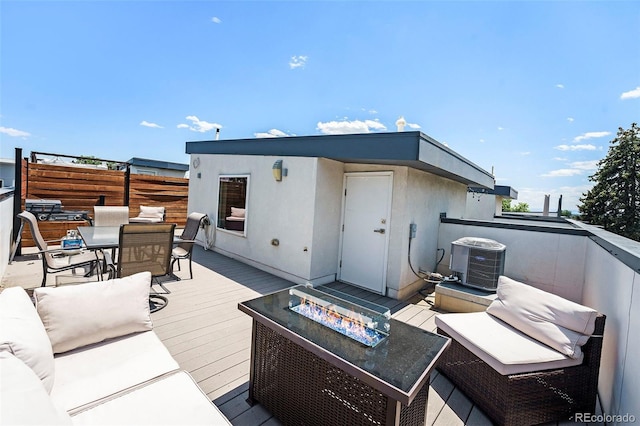 2726 Federal Blvd Unit 1, Denver, CO 80211 - wooden terrace with a fire pit and outdoor dining area