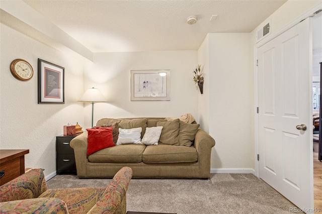 living room with light colored carpet