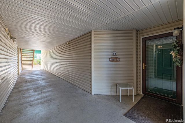 property entrance featuring a patio area