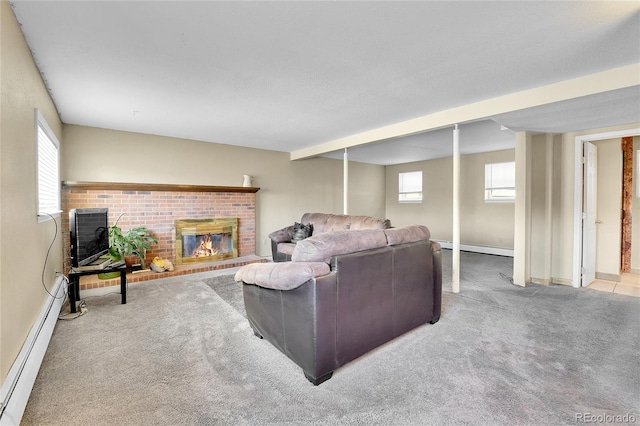 living room with a healthy amount of sunlight, light colored carpet, a fireplace, and baseboard heating