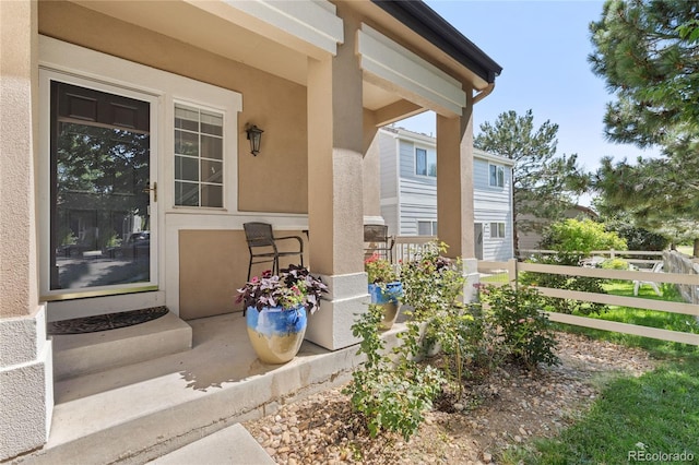 15125 E Bayaud Pl, Aurora, CO 80012 - view of exterior entry featuring stucco siding