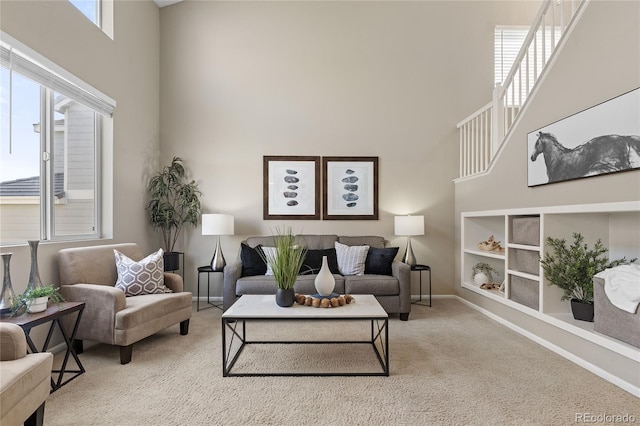 15125 E Bayaud Pl, Aurora, CO 80012 - carpeted living room with a high ceiling