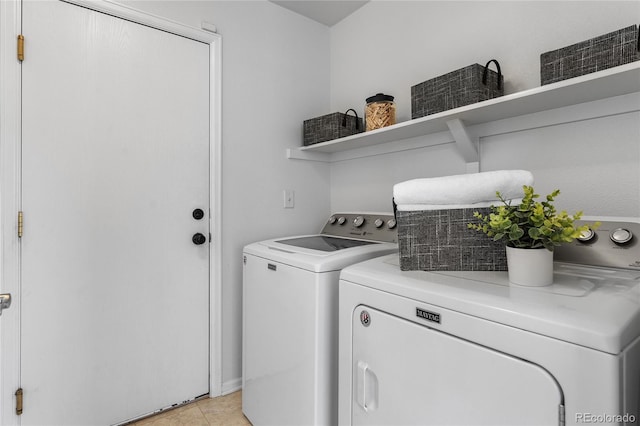 15125 E Bayaud Pl, Aurora, CO 80012 - laundry area with separate washer and dryer and light tile patterned floors