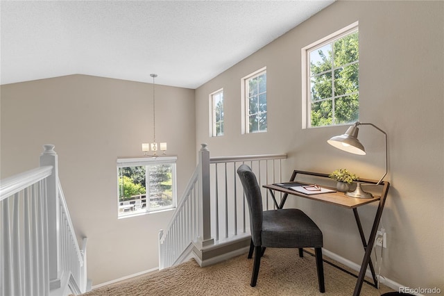 15125 E Bayaud Pl, Aurora, CO 80012 - home office featuring a chandelier, carpet, and lofted ceiling