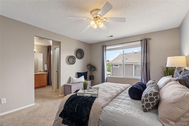 15125 E Bayaud Pl, Aurora, CO 80012 - bedroom featuring light colored carpet, a textured ceiling, ceiling fan, and ensuite bath