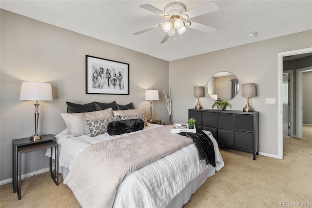 15125 E Bayaud Pl, Aurora, CO 80012 - bedroom featuring light colored carpet, ceiling fan, and a textured ceiling