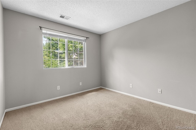15125 E Bayaud Pl, Aurora, CO 80012 - carpeted empty room with baseboards and a textured ceiling
