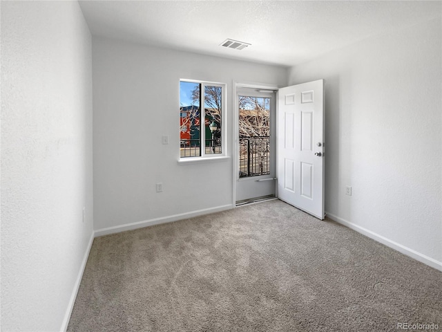 view of carpeted spare room