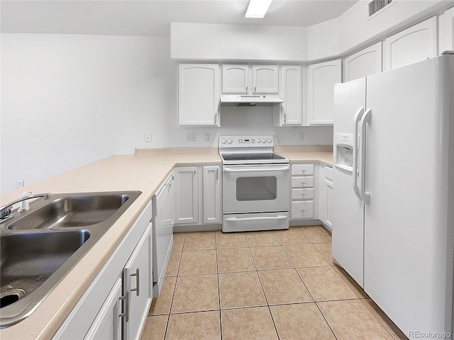 kitchen featuring white cabinets, sink, light tile patterned floors, and white appliances