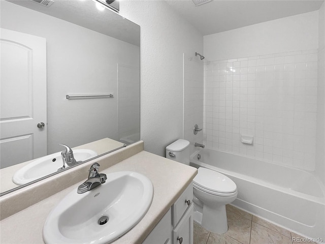 full bathroom with toilet, bathtub / shower combination, vanity, and tile patterned floors