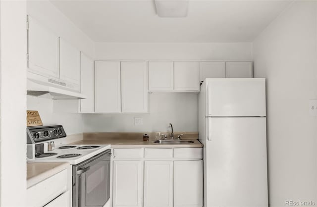 7100 Stuart St, Westminster, CO 80030 - kitchen with white appliances, a sink, under cabinet range hood, white cabinets, and light countertops