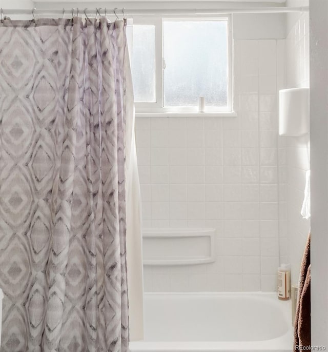 7100 Stuart St, Westminster, CO 80030 - bathroom with shower / tub combo with curtain